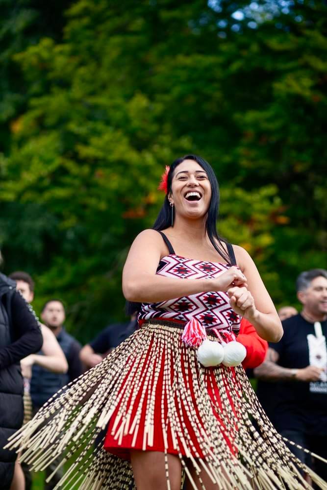 Māori kaihaka performing a haka in London