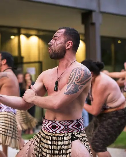 Ben Appleton, facilitator and performer at Haka International, performing a haka